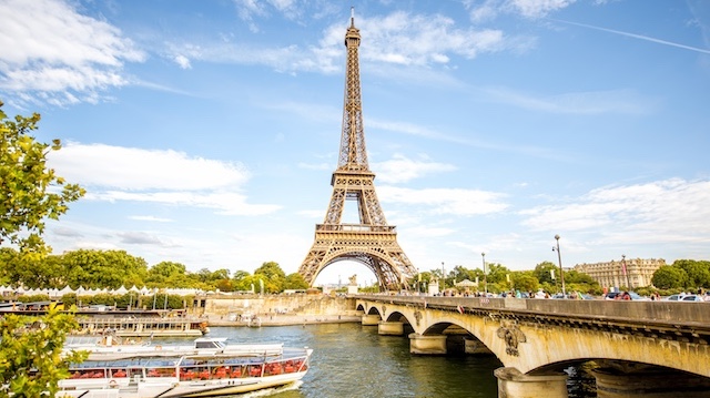View on the famous Eiffel tower with Seine river and bridge in Paris